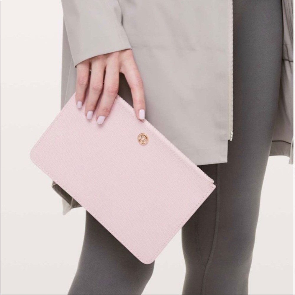 Lululemon Pink Clutch Wristlet Gold Logo Water Resistant Wipes Clean Goody Bag